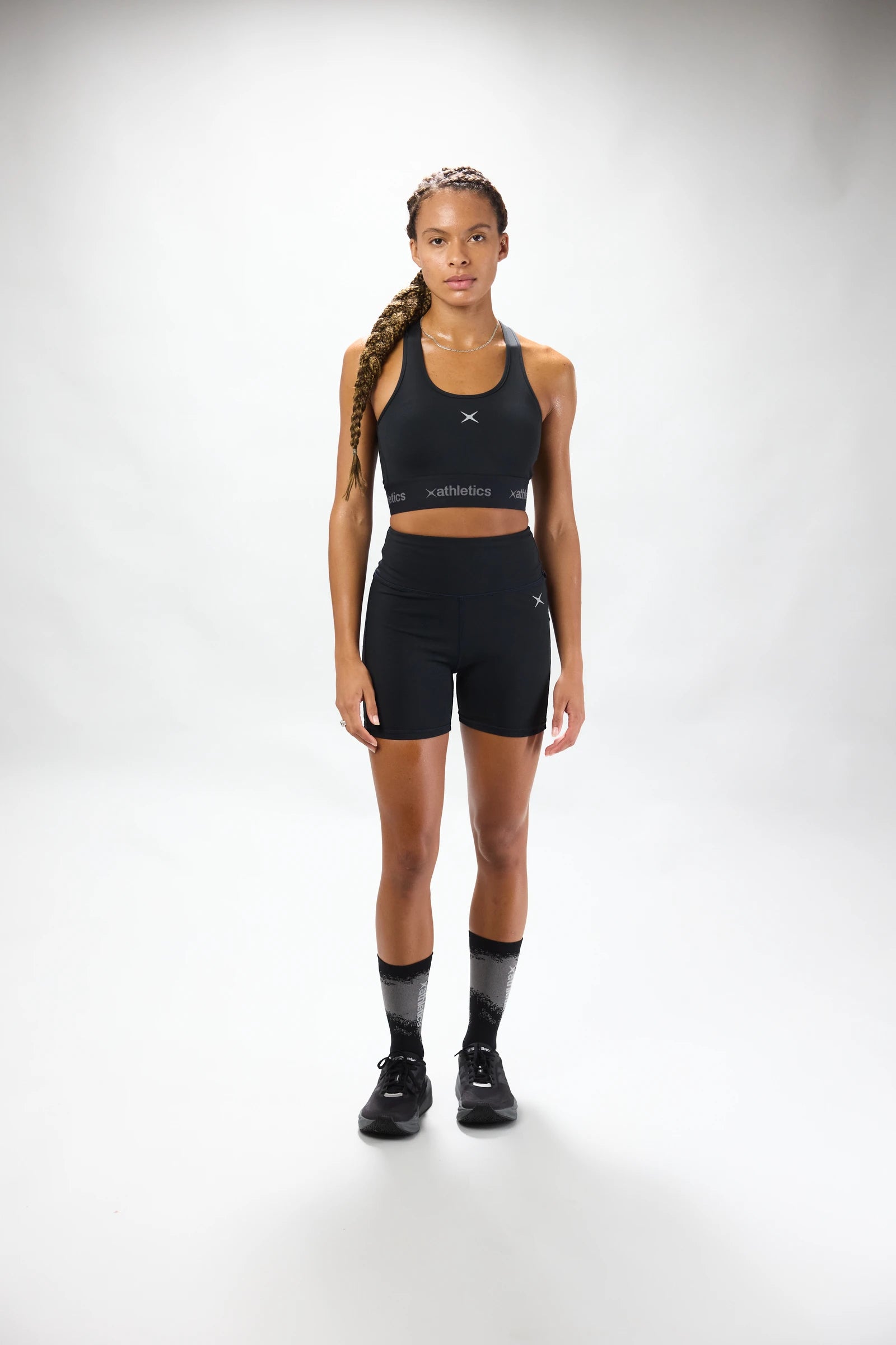 LEGGINGS CORTOS MUJER TRAIN NEGROS thumbnail